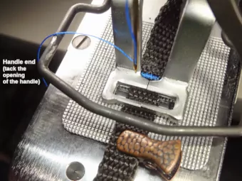 3/8-inch leash: handle-end, the handle opening clamped for bartacking